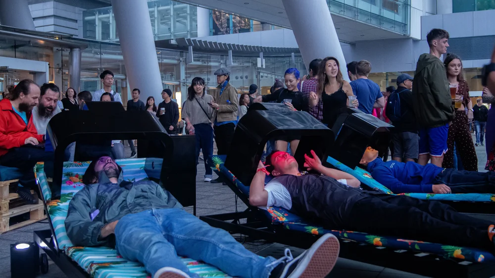 Visitors reclining on the I am emotion installation chairs at Sónar Hong Kong
